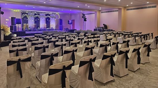 Image of a well-lit walkway leading to the ballroom & banquet hall, creating a welcoming ambiance.